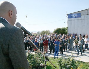 Guests listen to a speaker at the Heifer project launch celebration.